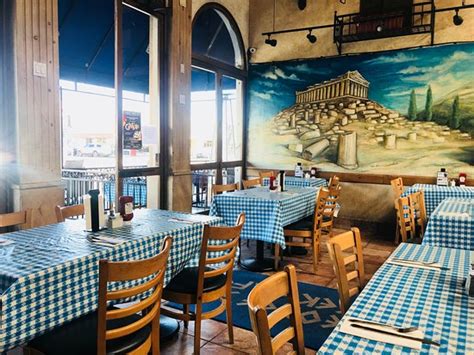 George's greek cafe - Hearty Greek staples dished up in a casual setting with large murals & weekly belly-dancing shows.